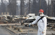 On November 19, urban search and rescue teams combed through the ashes of neighborhoods searching for any trace of human remains, such as bone fragments.