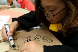 Kelvin Broadwater, as Harry Potter, prepares his “trick-or-treat” bag.