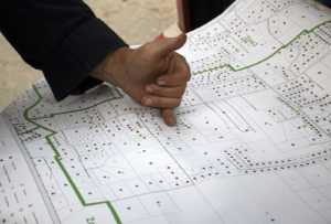 Symbols on the grid depicted the current status of each residence—whether they had been searched yet or not.