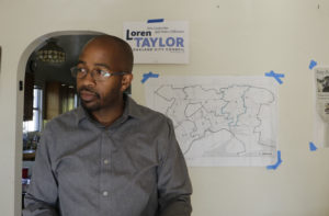 Candidate Loren Taylor standing in his campaign headquarters in Oakland. Photo by Shuang Li.
