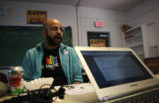 Anand Kalra, volunteer and volunteer driver at Cat Brooks’ headquarters offered rides to the polls to anyone who needed it. “It’s something I can do,” he said. Photo by Annie Berman.