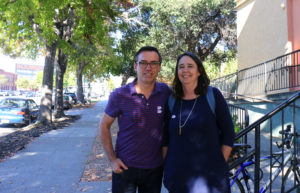 Sara Buckelew and Eric Bottino, Oakland voters who are married, after entering their ballots. Photo by Carla Williams.