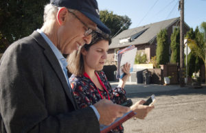Councilmember Dan Kalb (District 1) canvassed with District 4 candidate Nayeli Maxson Tuesday. They spent the morning making phone calls from Maxson’s home office then hit the streets, aiming to knock on 492 doors in a lower-income, more diverse neighborhood in the district. Photo by Sarah Trent.