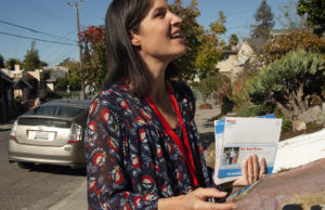 Nayeli Maxson is one of three women who campaigned together in District 4, hoping to ensure that a woman wins the seat being vacated by Annie Campbell-Washington. She went door to door Tuesday, sharing her support for all three candidates and the ways she stands out from the rest. Photo by Sarah Trent.