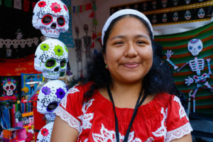 Altamirano says that the title of her altar, “Mother Earth Loves Us All,” is meant to encourage people to protect the Earth and its diversity. She worked with students from preschool to college age to add images highlighting Mexican-American issues and artists, victims of gun violence, and famous activists who tried to cultivate hope.