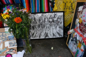 Altamirano’s altar featured some of her own work on the oppression of women. One piece depicted a crowd protesting for reproductive rights in Peru, where many women were sterilized without their consent during Alberto Fujimori’s presidency in the 90’s.