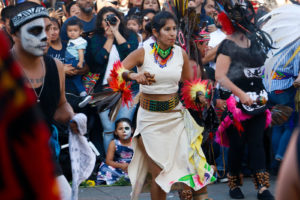 A child watches as traditional Aztec dancing is performed by groups from all over the Bay Area.