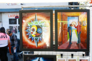 Gustavo Reynoso’s stand on International Boulevard and 35th Avenue showcases art on the themes of childhood and lessons learned from his mother. Reynoso, who is based in Sacramento, creates art related to his Chicano/Mexican American upbringing.