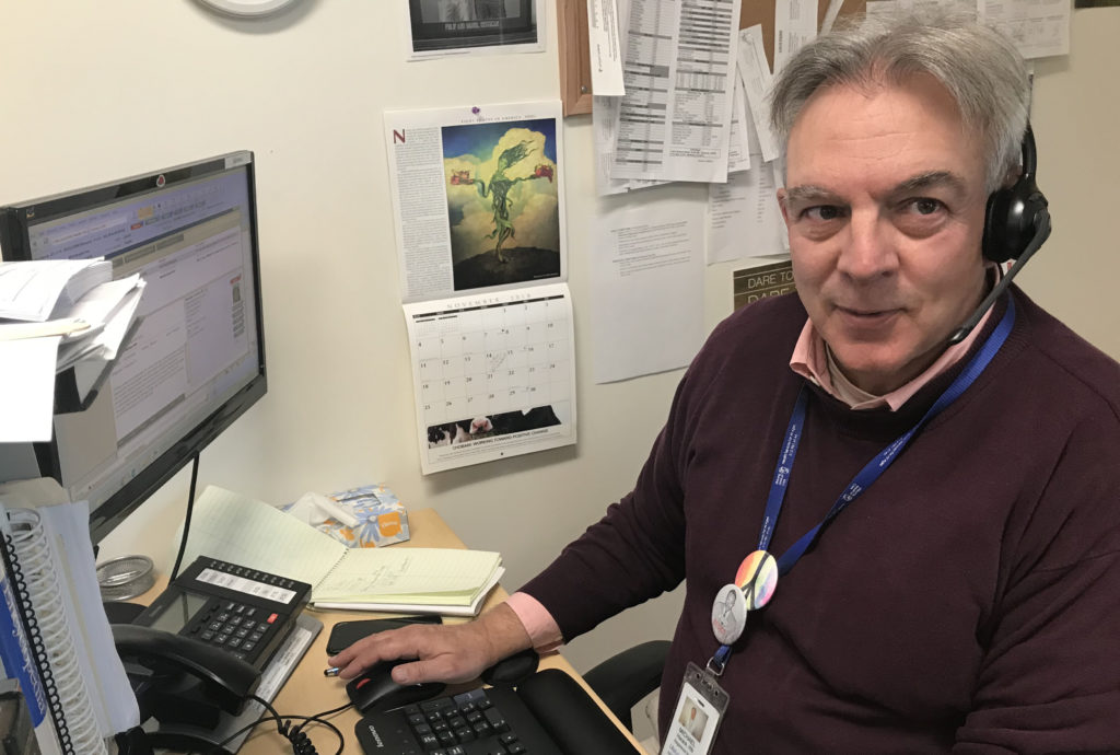 Michael Harank is at work at the Lifelong Medical Care clinic in Berkeley.