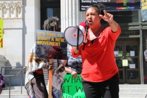 Brooks speaks at a protest in front of city hall blaming Schaaf for a recent fire at a homeless encampment: “I don’t have any problem saying her name. Libby Schaaf, shame on you!”