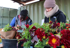 Myles offered Velasco and Onaderu guidance on what should go into their arrangements for that day. Velasco says that “she’s always been an outdoor person,” so she loves working with the flowers.