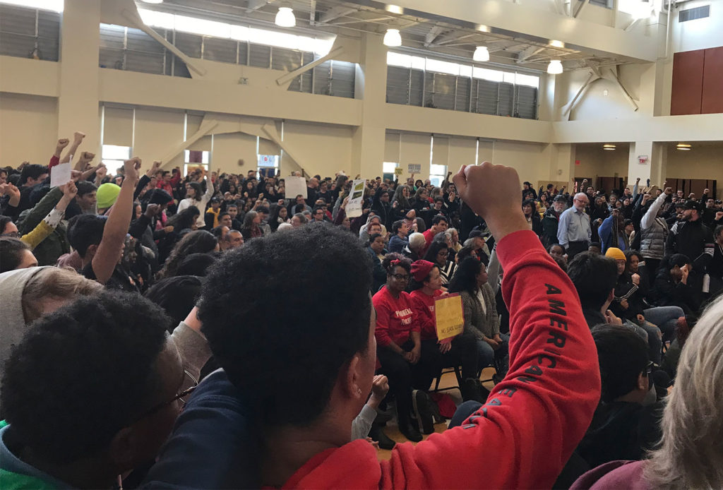 Hundreds of Oakland students protested budget cuts at a school board meeting in March. Last week, Oakland City Council restored funding for student programs affected by those cuts. Photo by Nikka Singh.