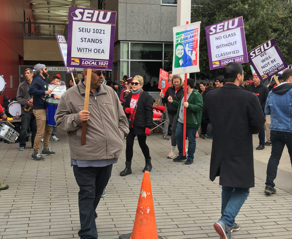 Classified workers represented by SEIU were on the picket lines with teachers during their strike in February. Now, classified workers are challenging layoffs and low pay.