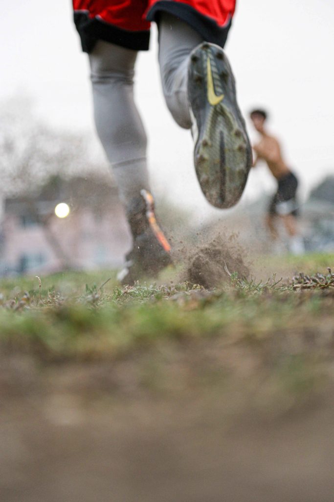 A Castlemont running back moves in motion during a practice.