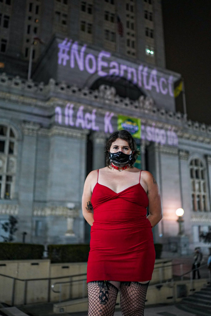 Sex workers protest the earn it act in front of city hall. Photo by George Barahona