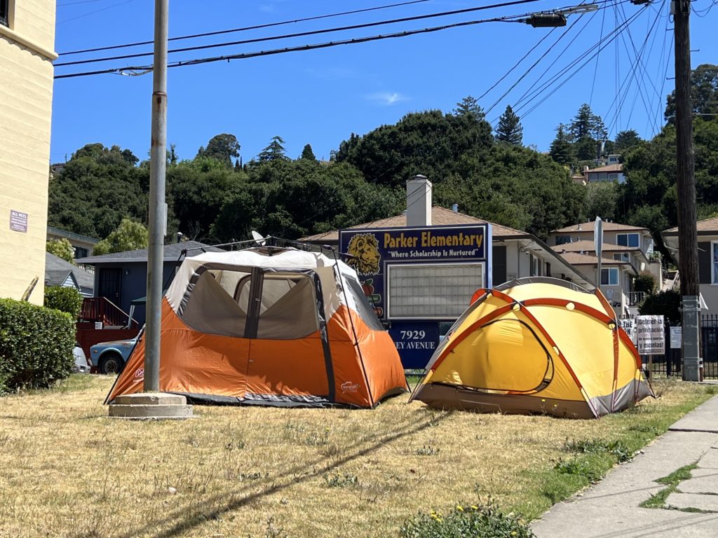 Tents in front of Parker Elementary School in Oakland, CA