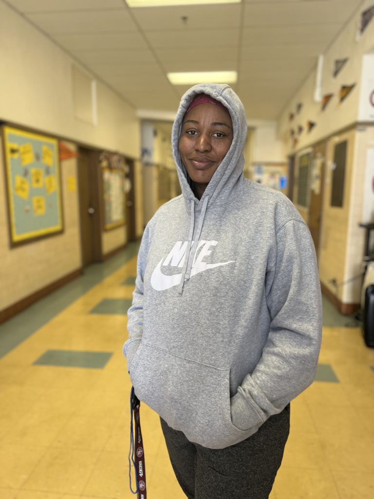 Parker Parent, Rochelle Jenkins, standing in the hallway of Parker Elementary School