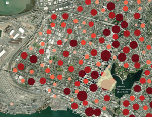 A map of the city with lots of pink, red and dark red circles of various sizes.